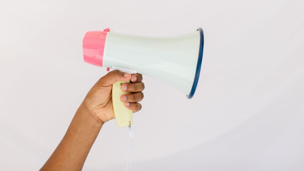 A megaphone to indicate the importance of overcoming objections to boost sales in your launch. 